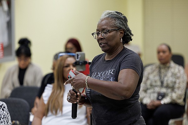 Grove West Home Owners Association president Barbara Hepburn speaks during Department of Physical Planning public hearing to discuss an application seeking site plan approval to construct a new hospital on North Bethel Highway at the Department of Physical Planning on October 6, 2025. Photo: Dante Carrer/Tribune Staff
