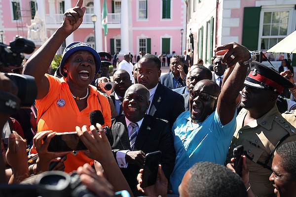 Prime Minister Philip Davis (center) is flanked by Bahamas Union of Teachers Belinda Wilson (left) and Bahamas Public Services Union president Kimsley Ferguson as he addressed workers gathered outside the House of Assembly following a protest march. Photo Dante Carrer/Tribune
