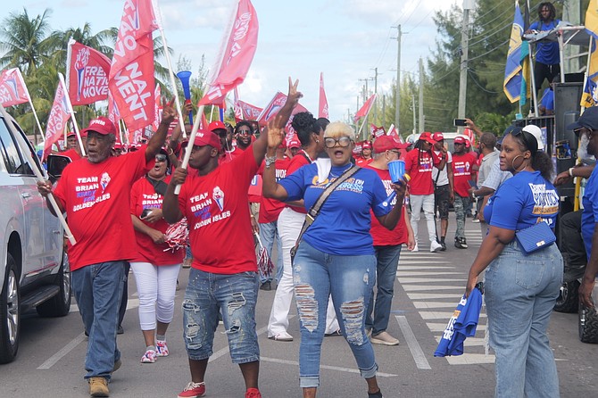 Supporters for the Progressive Liberal Party and Free National Movement share the street as they gathered at Anatol Rodgers High School for Nomination Day on October 31, 2025.