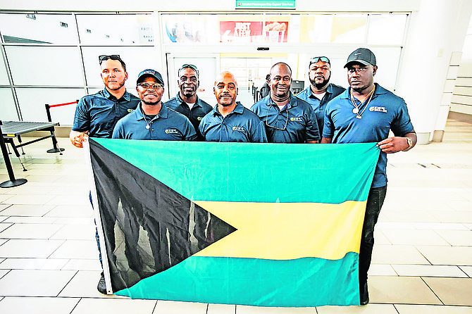 BPL workers waiting to board a flight to Jamaica to assist in their recovery efforts after the passage of Cat 5 Hurricane Melissa.