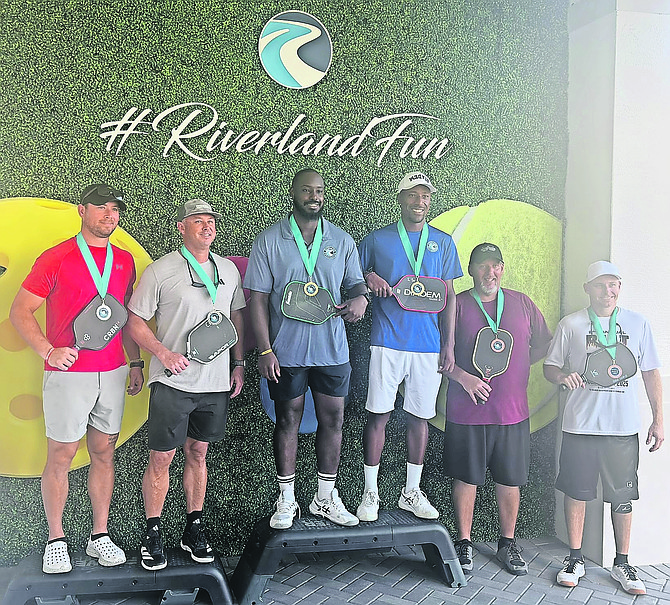 Justyn Thompson and Brezile Hamilton on top of the podium at Riverland
Pro Pickleball Invitational in Port St Lucie, Florida.