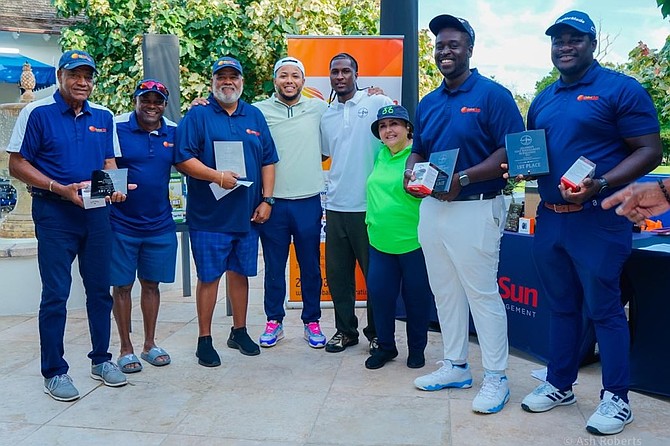First place winners with James Clarke of sponsors Global Sun and organizers Todd Isaacs Jr, Lucius Fox and Gina Gonzalez-Rolle.