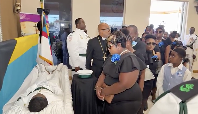 FAMILY, friends and colleagues pay their respects during a funeral service for Marine Seaman Demeris Armbrister Jr on December 12, 2025.