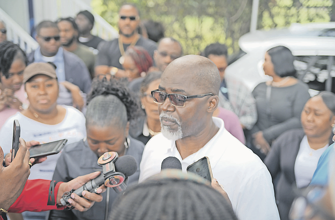 BCPMU president Kendrick Knowles speaks to reporters as BTC workers protest working conditions yesterday. Photo: Chappel Whyms Jr