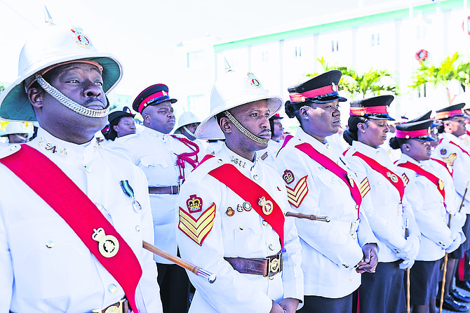 The RBPF marching band performs during their annual Garden Ceremony and Parade yesterday. Photo: Shawn Hanna