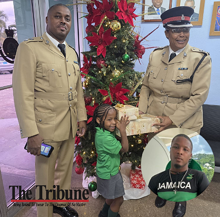 Chief Superintendent Chrislyn Skippings pays a visit to Quay’liah Arnett on her fifth birthday. Quay’liah witnessed her father Quintero Arnett (inset) shot to death in February last year.