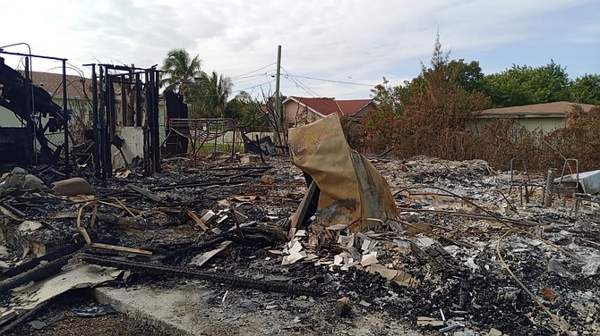 Okino Kareem Burrows lost everything as a fire destroyed the home in which he lived at 3am yesterday in Hepburn Town, Grand Bahama. Photo: Denise Maycock