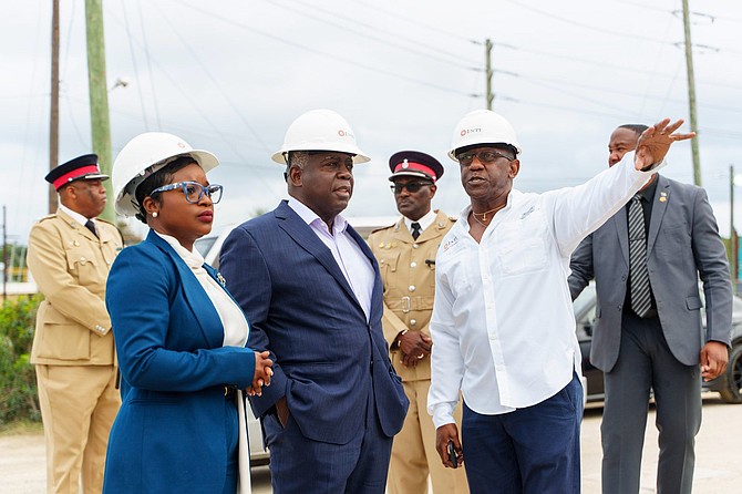 PRIME Minister Philip Davis, alongside Minister of Energy and Transport, JoBeth Coleby-Davis, touring the Blue Hills Solar Project.