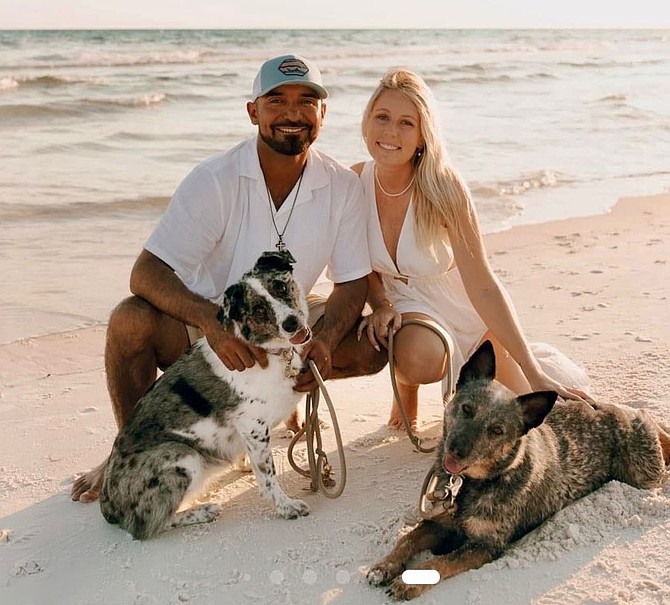AMERICAN Pike Corporation worker Cody Castillo pictured with his wife Makayla and their two dogs.