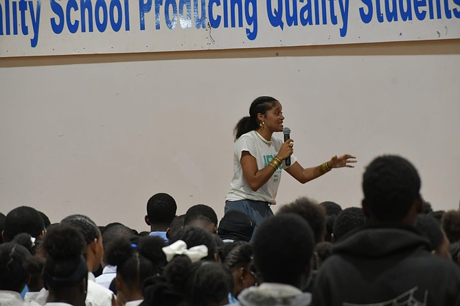 Beijing Rodgers of faith based organisation It’s Our Turn speaks with students during one of the group's Hope Tours at public schools in Nassau.