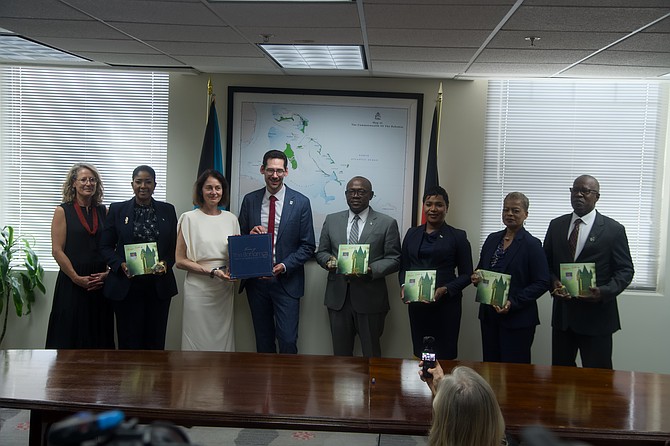 NASSAU, Germany Mayor Manuel Liguori (4th from left) stands next to Deputy Prime Minister Chester Cooper along with Minister of Grand Bahama Ginger Moxey and other govt and German officials at the sister city signing agreement ceremony on March 30, 2026. Photo: Chappell Whyms Jr