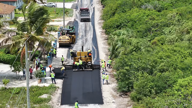 A still taken from a video showing road works underway for the Eleuthera Road Improvement Project (Bahamas Striping Group of Companies)
