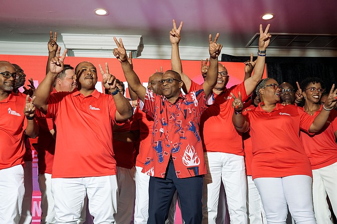 FNM leader Michael Pintard and dputy leader Shanendon Cartwright stand on stage at the event to release the party’s plan for the upcoming election. Photos: Shawn Hanna