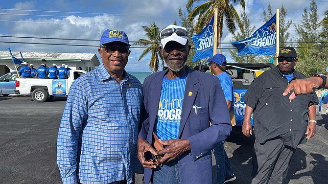 Foreign Affairs permanent secretary Melvin Seymour (lefT)