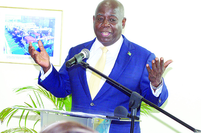 Prime Minister Philip 'Brave' Davis speaks during a ceremony for the signing for the govt to acquire all remaining shares in Grand Bahama Power Company. Photo: Vandyke Hepburn