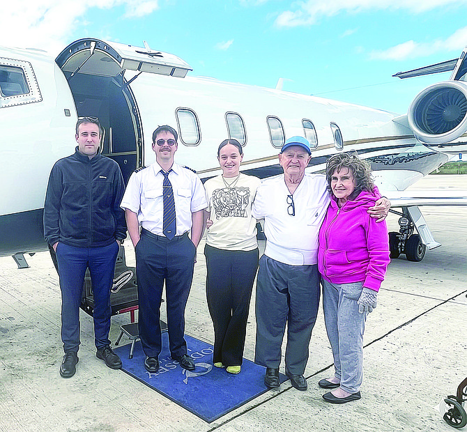 Rupert Roberts at his return home from hospital, seen with his wife Margaret and granddaughter Paige Waugh.