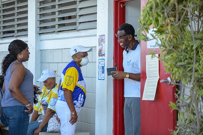 A voter heads into a polling division at Sandilands Primary School on May 12, 2026. Photo: Shawn Hanna