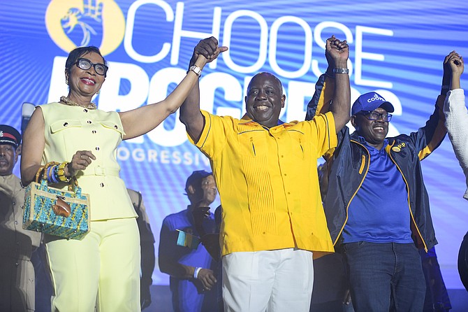Prime Minister Philip Davis celebrates on stage at Clifford Park after his party secured a second term in government on May 12, 2026.