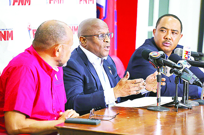 FNM leader Michael Pintard speaks during a press conference in 2024 as deputy leader Shannendon Cartwright looks on.