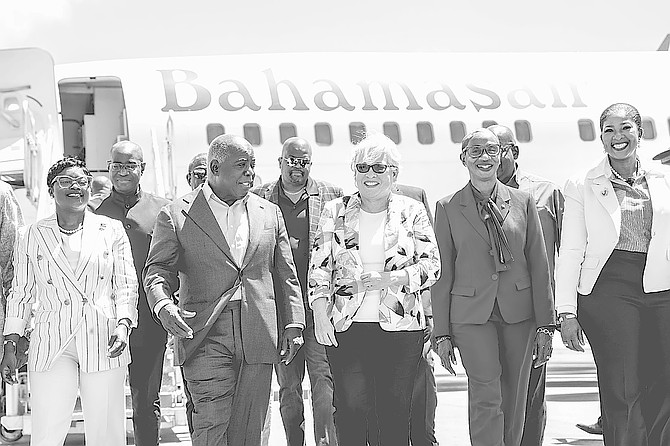 Prime Minister Philip ‘Brave’ Davis, Minister of Tourism Glenys Hanna-Martin, Minister of Energy, Utilities and Aviation Jobeth Coleby Davis and other govt officials arrive on the inauguarl Bahamasair flight to Cat Island, resuming service to the island after 20 years.