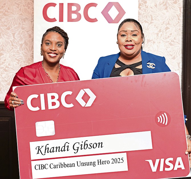 Standing from left to right are Nekessa Beneby, CIBC Caribbean Human Resources Head and Khandi Gibson CIBC Caribbean Unsung Hero 2025.