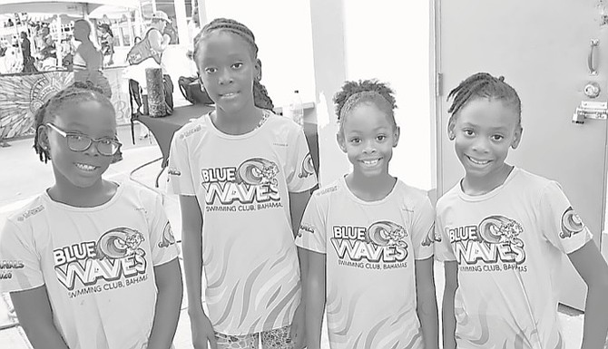 Blue Waves' girls 8-and-under 200m medley relay team, pictured from left to right, Layla-Ray Julien, Madison Richards, Peyton Bostwick and Charlotte King.