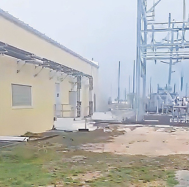 Smoke billows out of a building after a lightning strike at the Blue Hills Power Station led to an explosion at the location, creating a disruption on the network and interrupting power supply to multiple areas across New Providence yesterday.