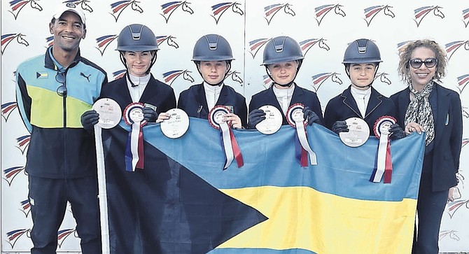 Good Overall Team Effort: Team Bahamas members show off their 4th place awards.