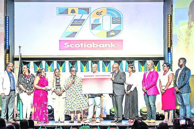 Scotiabank Executives presenting $5000 donation to Pastor Erica Moxey & Pastor Mario Moxey for their Guardian Angels Program
