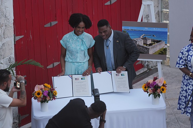 MINISTER of Culture, Arts and Heritage Leslia Miller-Brice and US Amabassador Herschel Walker sign an agreemnt for the United States to invest $245,000 to restore Fort Montagu.
Photos: Chappell Whyms Jr