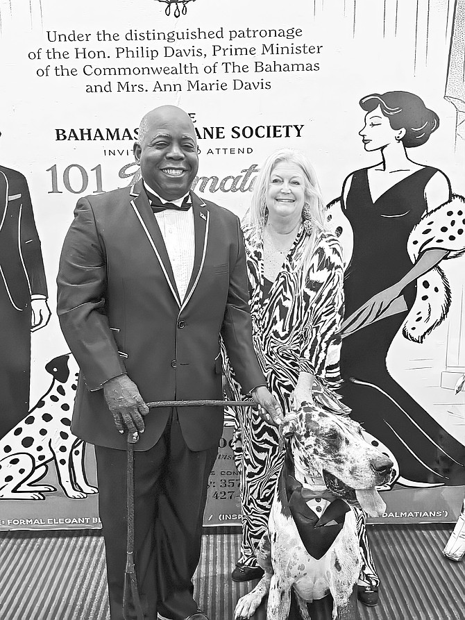 The Prime Minister of The Bahamas is Philip “Brave” Davis, along with the outgoing president of the Bahamas Humane Society, Kim Aranha.