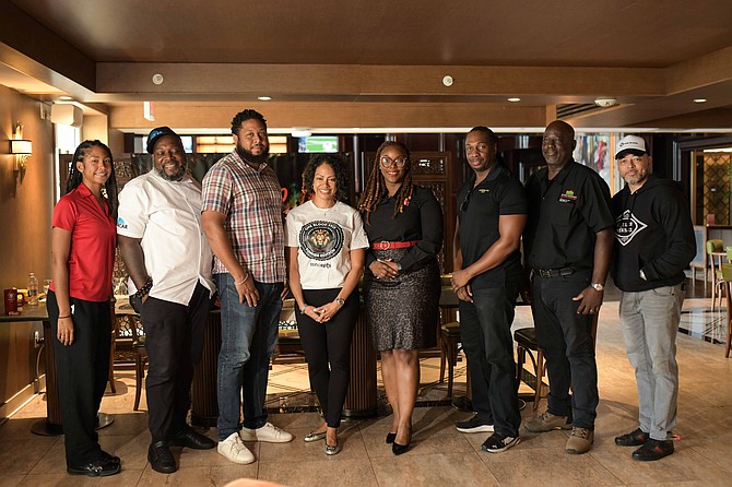 Organisers and partners of the One Blood concert address members of the media during a press conference outlining plans for the December event. Pictured from left are Imani Davis of Concepts Events; Chef Simeon Hall Jr., Culinary Advisor; Jared Cartwright, Guinness Brand Manager; Leah Davis, CEO of Concepts Events; Bodine Johnson, Brand Ambassador; John Dennis Stewart of Higher Level Band; Brian Gibson of Sound Investments, AV Partners; and Ryan Davis of Concepts Events.