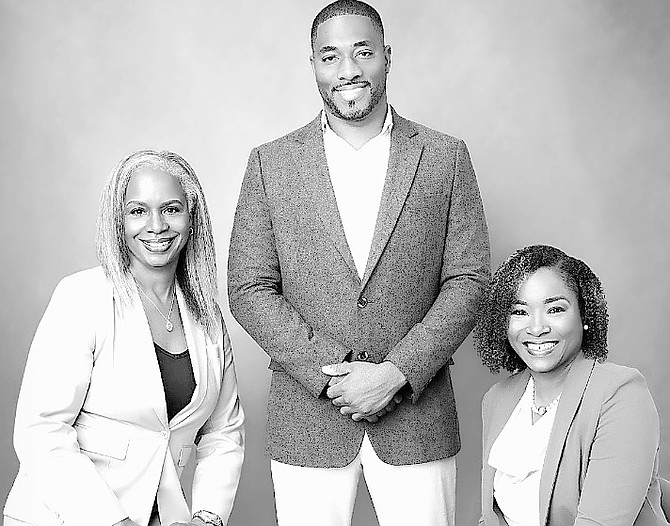 CERON Rolle (centre), founder and broker/owner of Rolle Realty Group, with advisers Indira Rolle-Thompson (left) and Ria C. Butler (right). Fellow adviser Timothy Covington, who is based in Exuma, is not pictured.
Photos: Donavan McIntosh/Fusion IMC