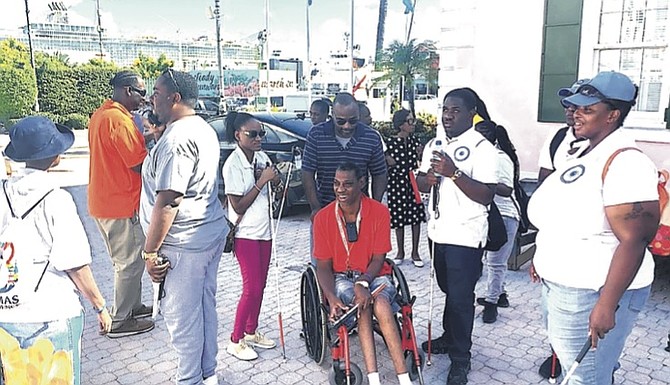The Bahamas Alliance for the Blind and Visually impaired led a walk from Rawson Square to Government House to mark White Cane Day.