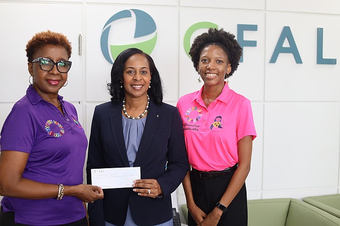 Standing together: CFAL’s Sophia Thurston (centre), Vice President of Pension Administration and Operations, presents a sponsorship donation to Helen Forbes (left), Treasurer, and Alexandria Armbrister, Operations Manager, of the Gennie Dean Caring and Sharing Cancer Support Group. It is the third consecutive year CFAL has supported the group, adding to its longstanding backing of breast cancer causes, including the CIBC Walk for the Cure.