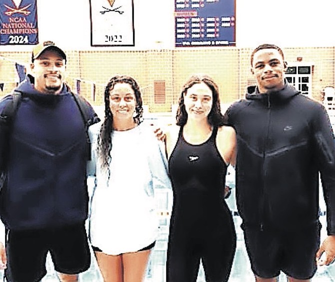 Lamar Taylor, far right, and other swimmers at the UVA Pro Elite SCM Worlds Prep Meet in Charlottesville, Virginia.