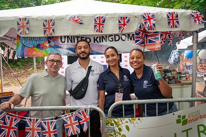 The British High Commission Nassau's GREAT British Pantry booth at the International Cultural Wine and Food Festival. From left, Jason McDowall (CEO of Bahamas Local & Volunteer), Ryan Griffin; deputy high commissioner, Smita Rossetti; British high commissioner of Nassau, Amber Aranha of The British High Commission at the UK Booth.