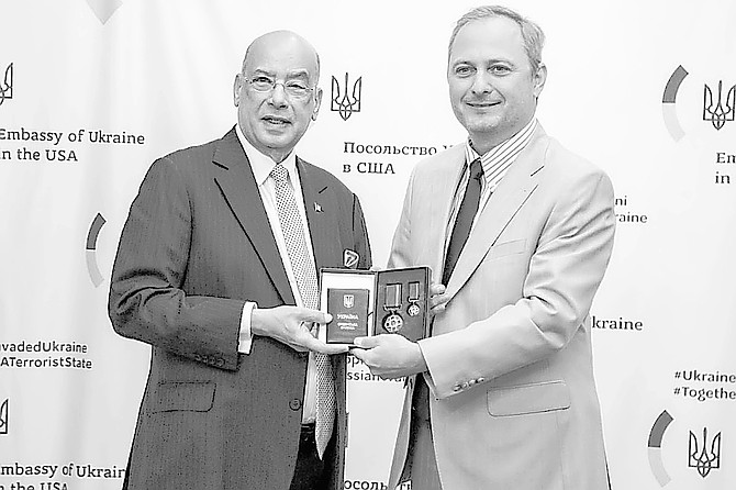 Sir Ronald Saunders accepts Ukraine's Order of Merit Award on October 19th.
