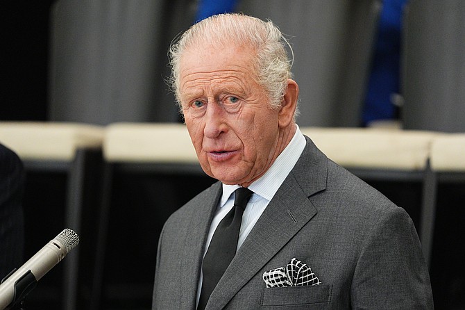 Britain's King Charles III speaks during a visit to the Aberfan and Merthyr Vale Community Centre in Aberfan, Wales, on Oct. 21, 2026. (Aaron Chown/PA via AP, Pool)