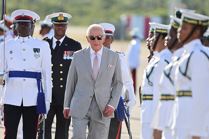 King Charles III inspects Royal Bahamas Defence Force marines at Lynden International Airport after arriving in The Bahamas on October 27, 2026. Photo: Eric Rose/BIS