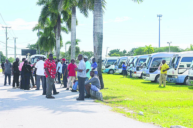 BUS operators park their buses at RM Bailey Park yesterday as they strike to demand higher fares.
Photo: Chappell Whyms Jr